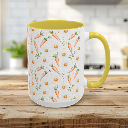 15oz ceramic mug with a white exterior, carrot and daisy pattern, and a yellow interior and handle.
