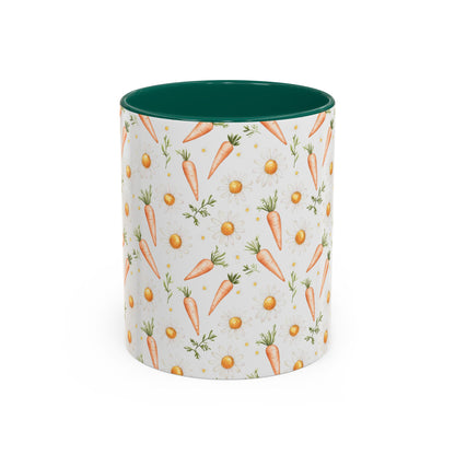 White ceramic mug with watercolor carrots and daisies, featuring a dark green interior and handle.