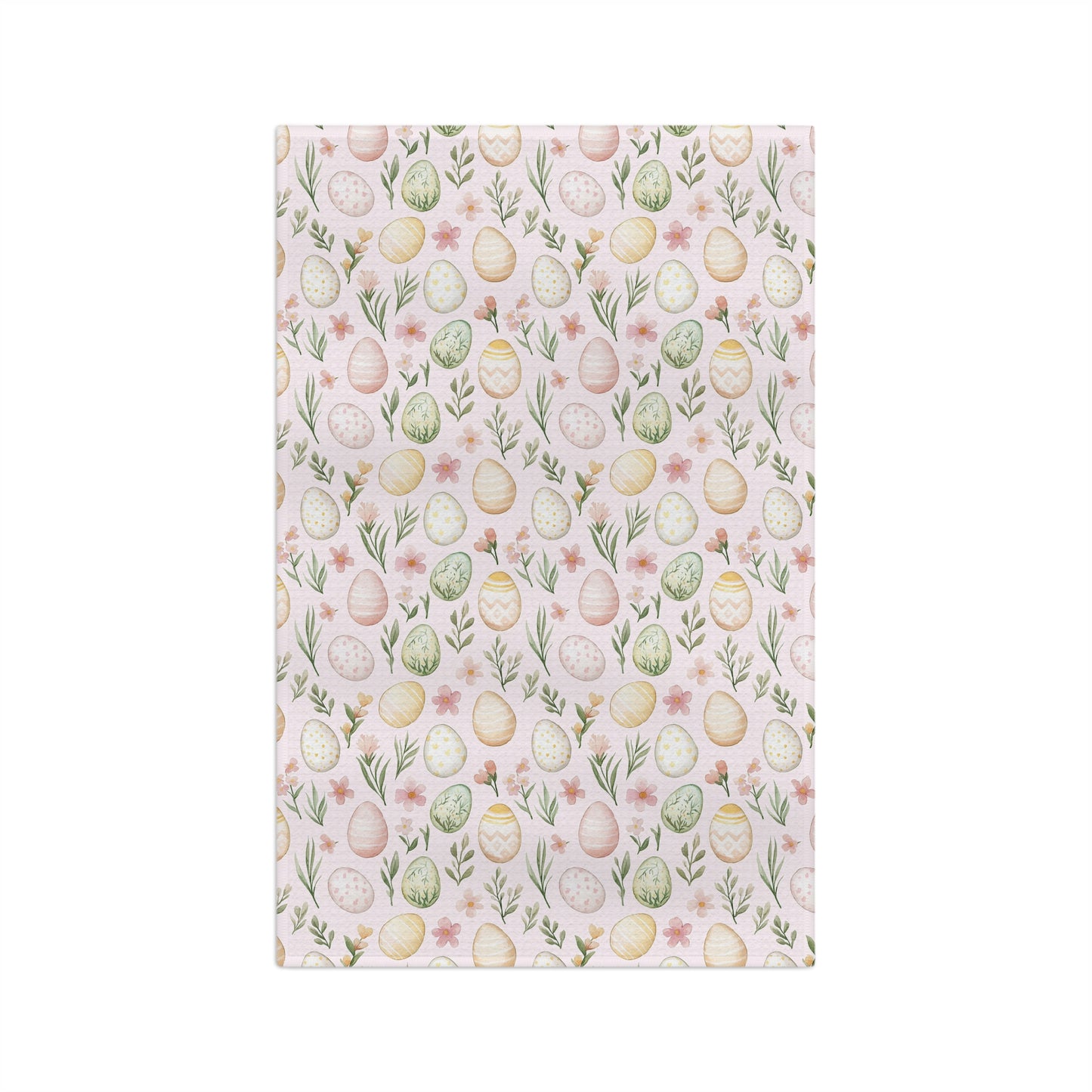 Pastel pink microfiber tea towel with watercolor Easter eggs, sprigs, and flowers.