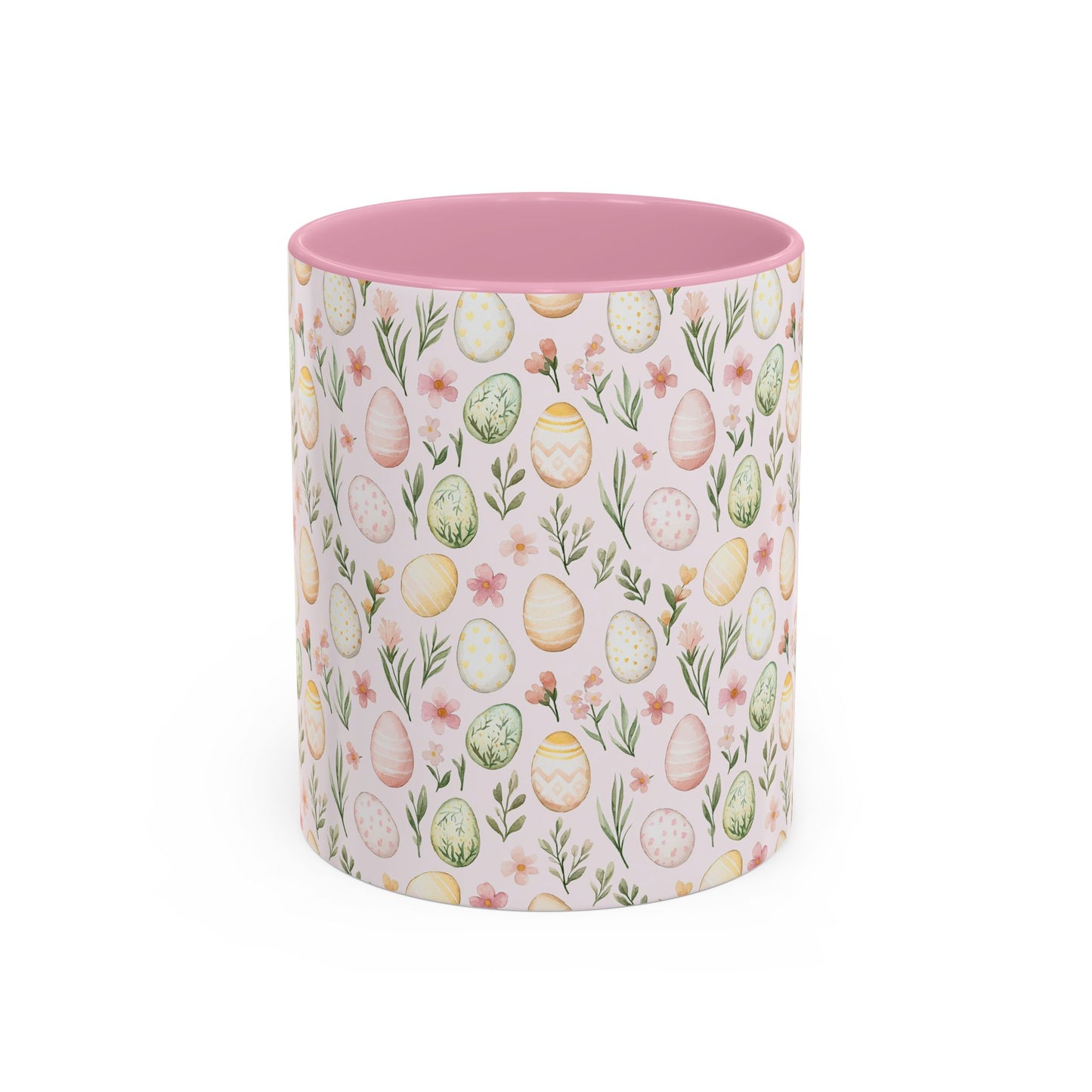 Ceramic mug with a pink interior, featuring a pastel watercolor Easter egg and floral pattern.
