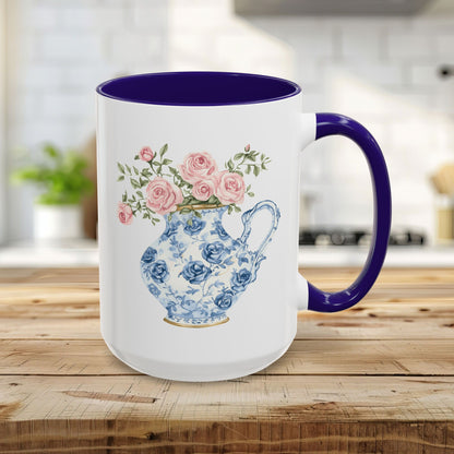 15oz ceramic mug with a blue interior, C-handle, and a vintage blue-and-white pitcher with pink roses design.