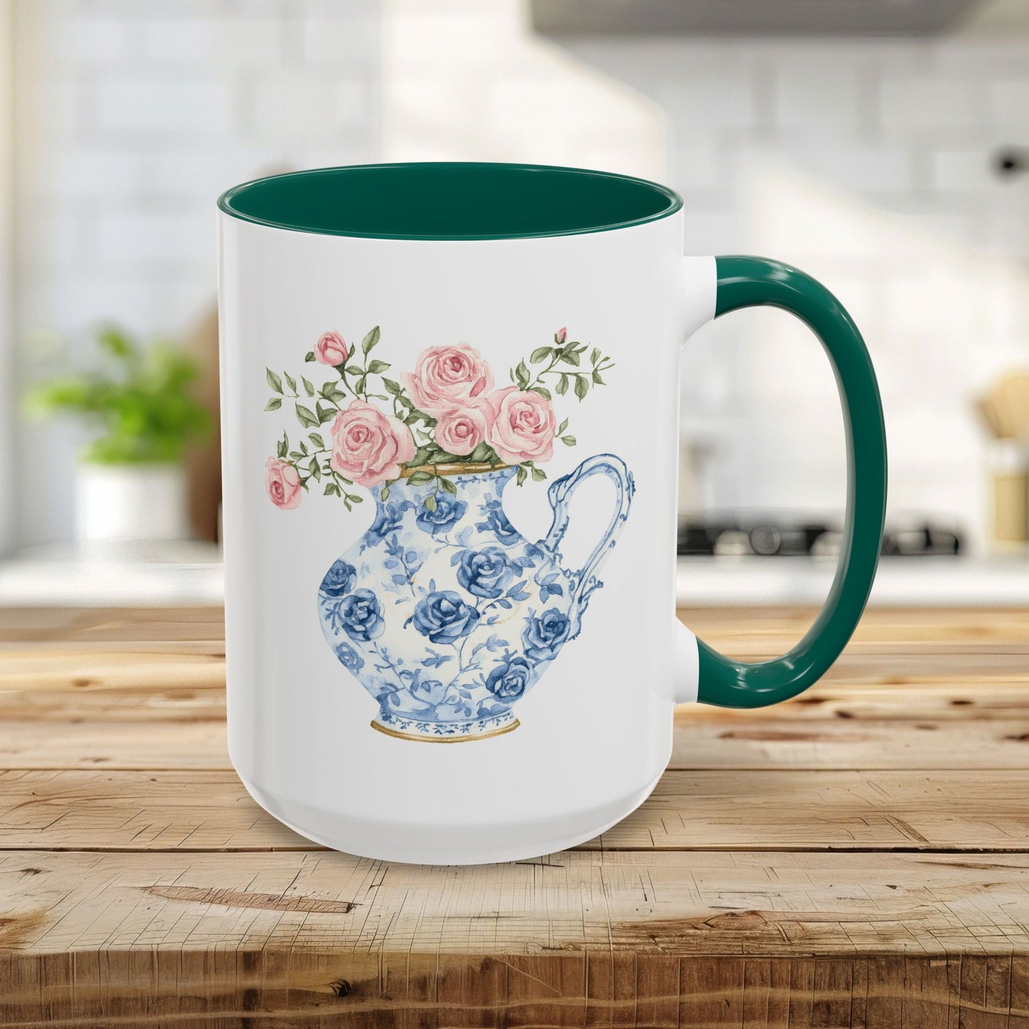 15oz white ceramic mug with green interior/handle, featuring a blue-and-white porcelain pitcher with pink roses.