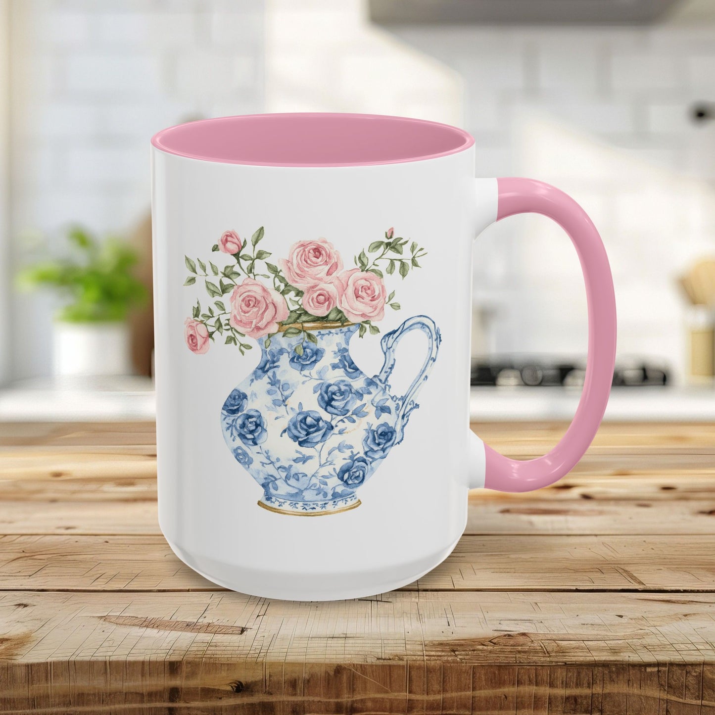 15oz ceramic mug with a pink handle and interior, featuring a blue-and-white porcelain pitcher with pink roses.