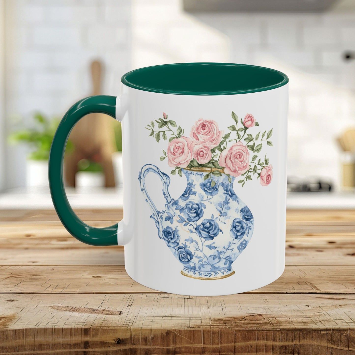 White ceramic mug with green interior and handle, featuring a blue-and-white rose pitcher design.