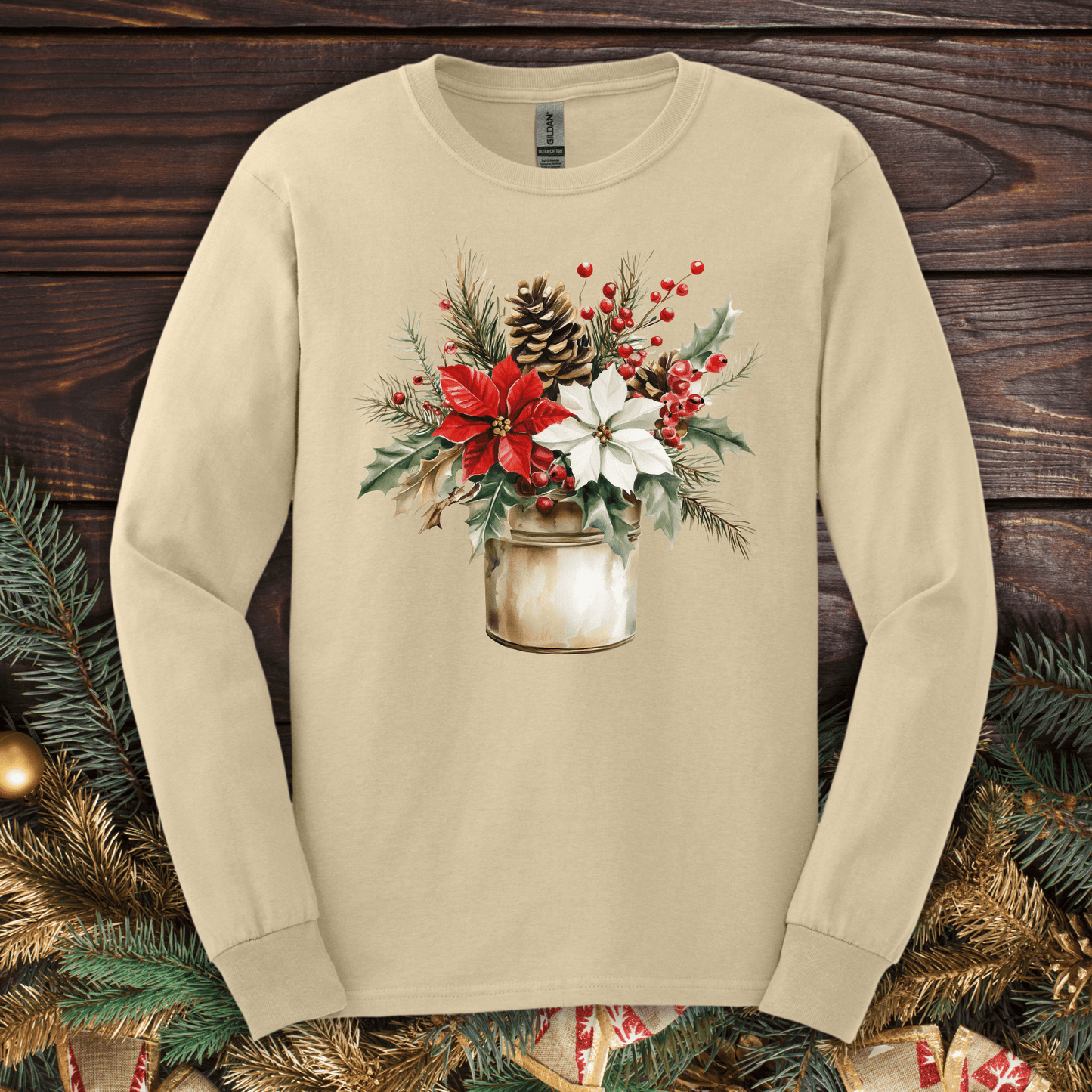 Sand Gildan long sleeve tee with watercolor Christmas bouquet in a rustic metal jar.