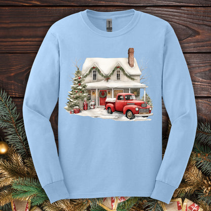 Light blue Gildan long sleeve tee, size S, with a watercolor farmhouse Christmas scene.