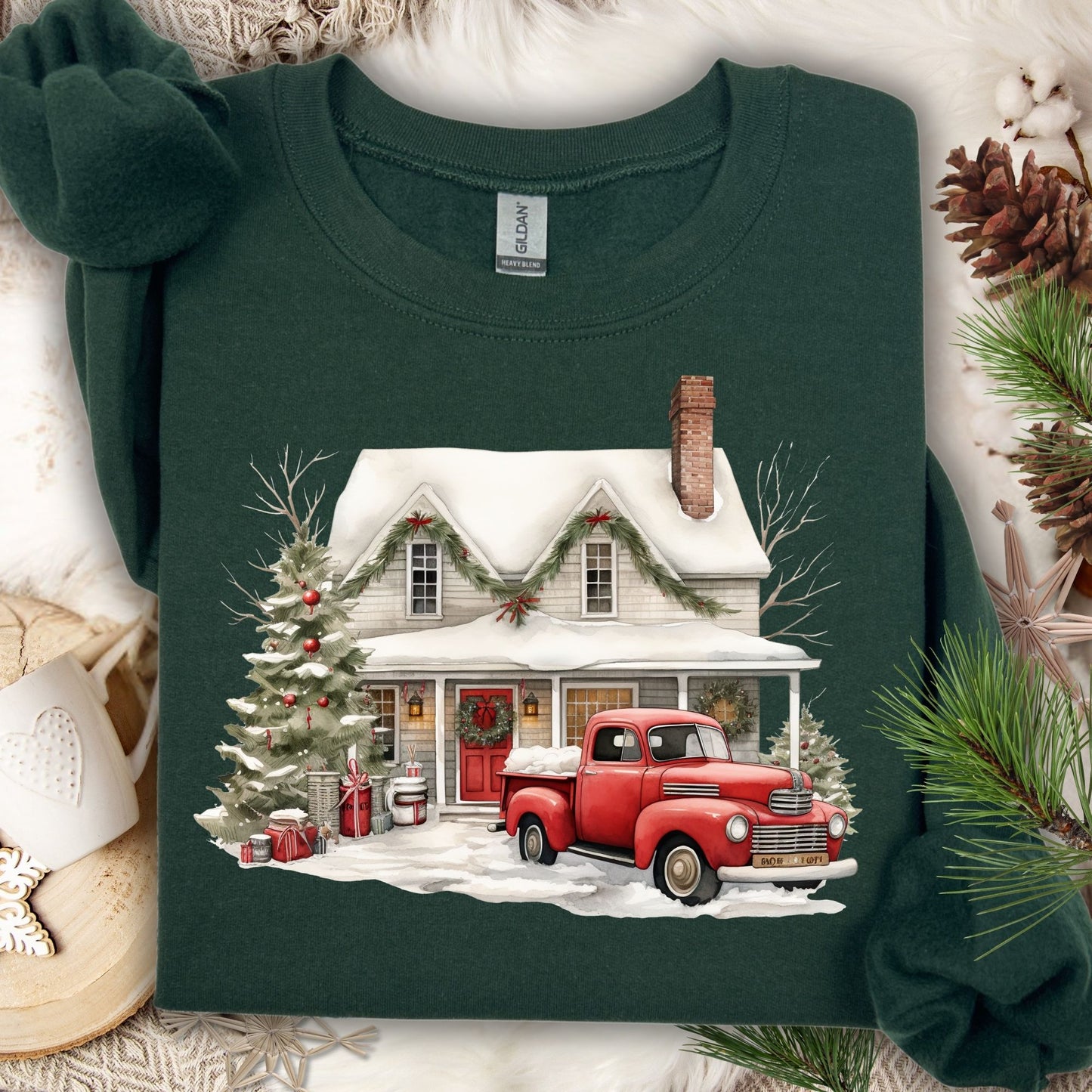 Forest Green Gildan sweatshirt with a watercolor farmhouse, red vintage truck, and Christmas tree in snow.