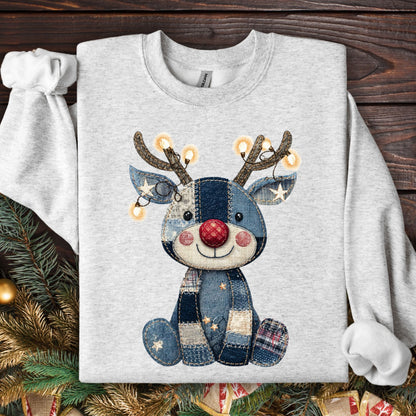 Ash gray sweatshirt with a faux denim patchwork Rudolph, string lights on antlers.