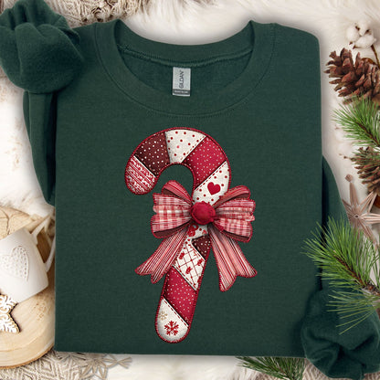 Forest green Gildan sweatshirt with vintage faux patchwork candy cane and red bow.