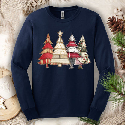 Navy long sleeve tee with a rustic faux patchwork Christmas tree design in reds, greens, and neutrals.