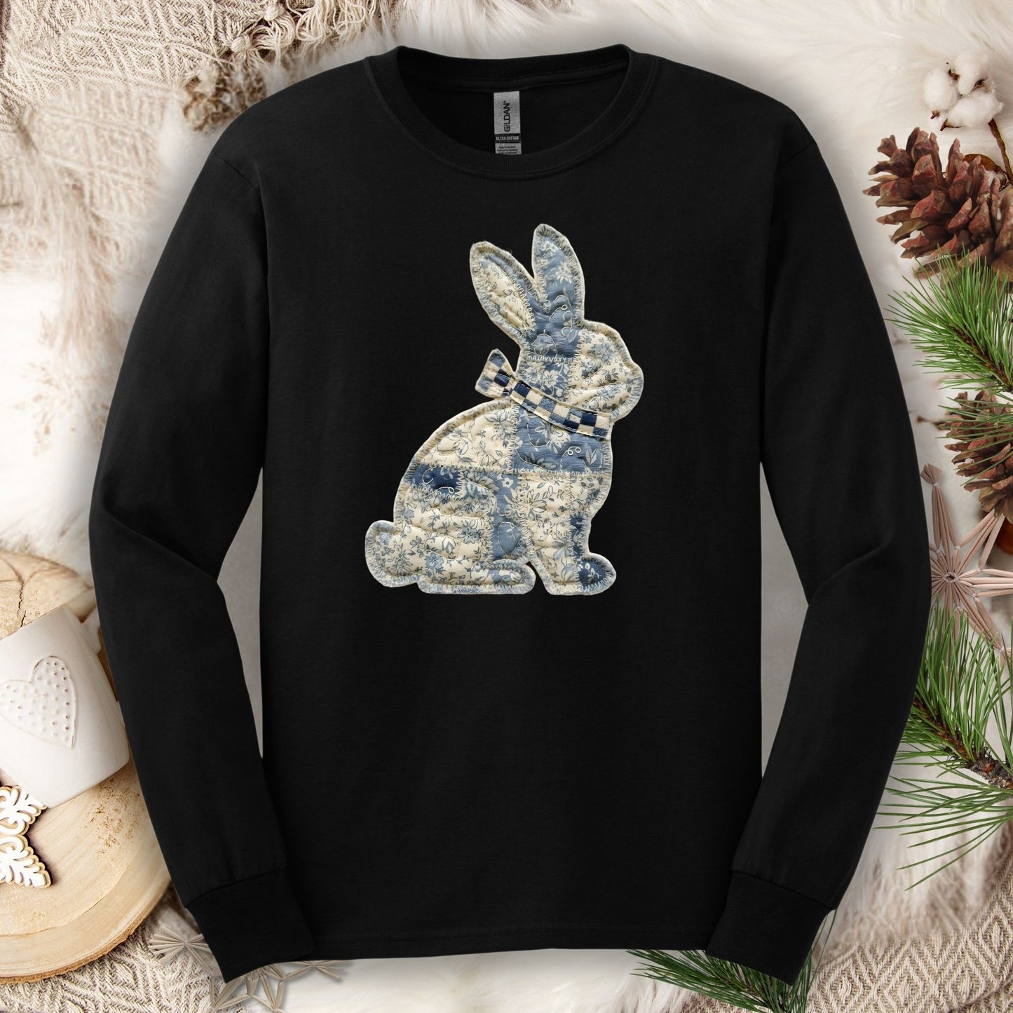 Black long-sleeve tee with a blue and white faux patchwork country bunny design.
