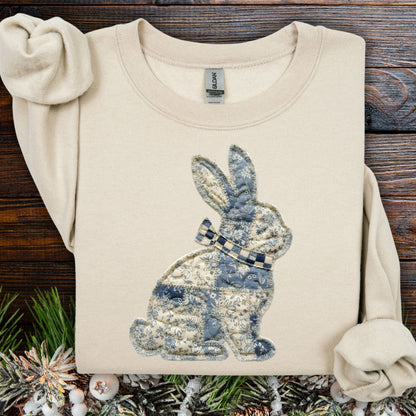 Sand Faux Patchwork Country Bunny Sweatshirt, 50% cotton/50% polyester, with blue and white bunny design.