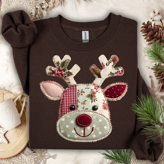 Dark Chocolate Gildan sweatshirt with a faux patchwork Rudolph face in sage green, rustic red, and floral fabrics.