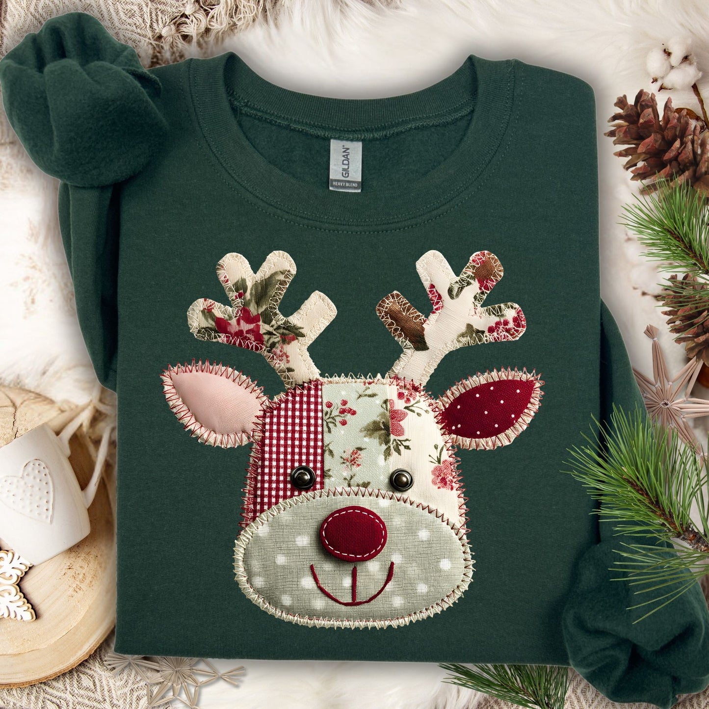 Forest Green Gildan sweatshirt with a patchwork Rudolph face, featuring gingham, polka dot, and floral fabrics.