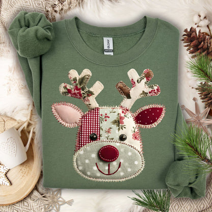 Military green Gildan sweatshirt with a faux patchwork Rudolph face in sage green, rustic red, and floral patterns.