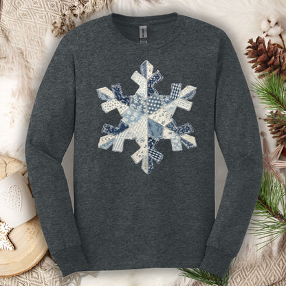 Dark heather long sleeve tee with a faux patchwork blue and white country snowflake design.