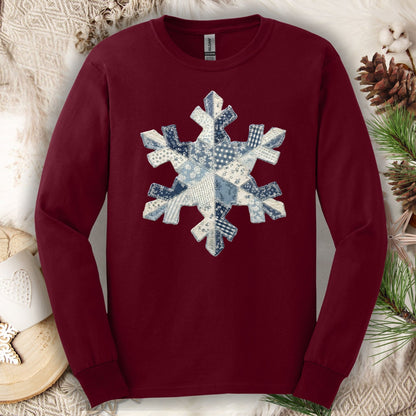 Maroon long sleeve tee with a faux patchwork blue and white country snowflake design.