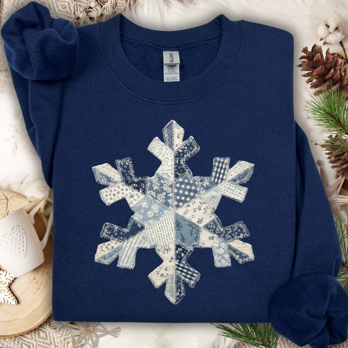 Navy faux patchwork snowflake sweatshirt, 50/50 cotton-poly blend, with country charm.
