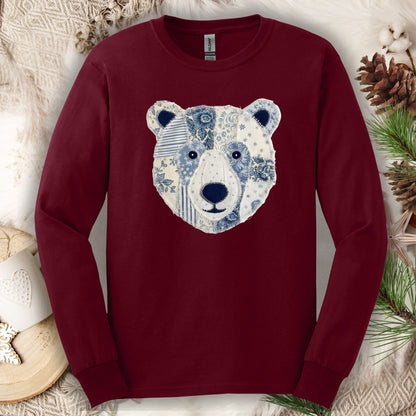 Maroon long-sleeve tee with a faux patchwork winter bear face design.