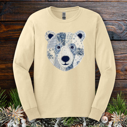 Sand long-sleeve tee with a faux patchwork blue and white winter bear face design.