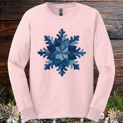 Light pink long sleeve tee with a faux patchwork denim snowflake design.