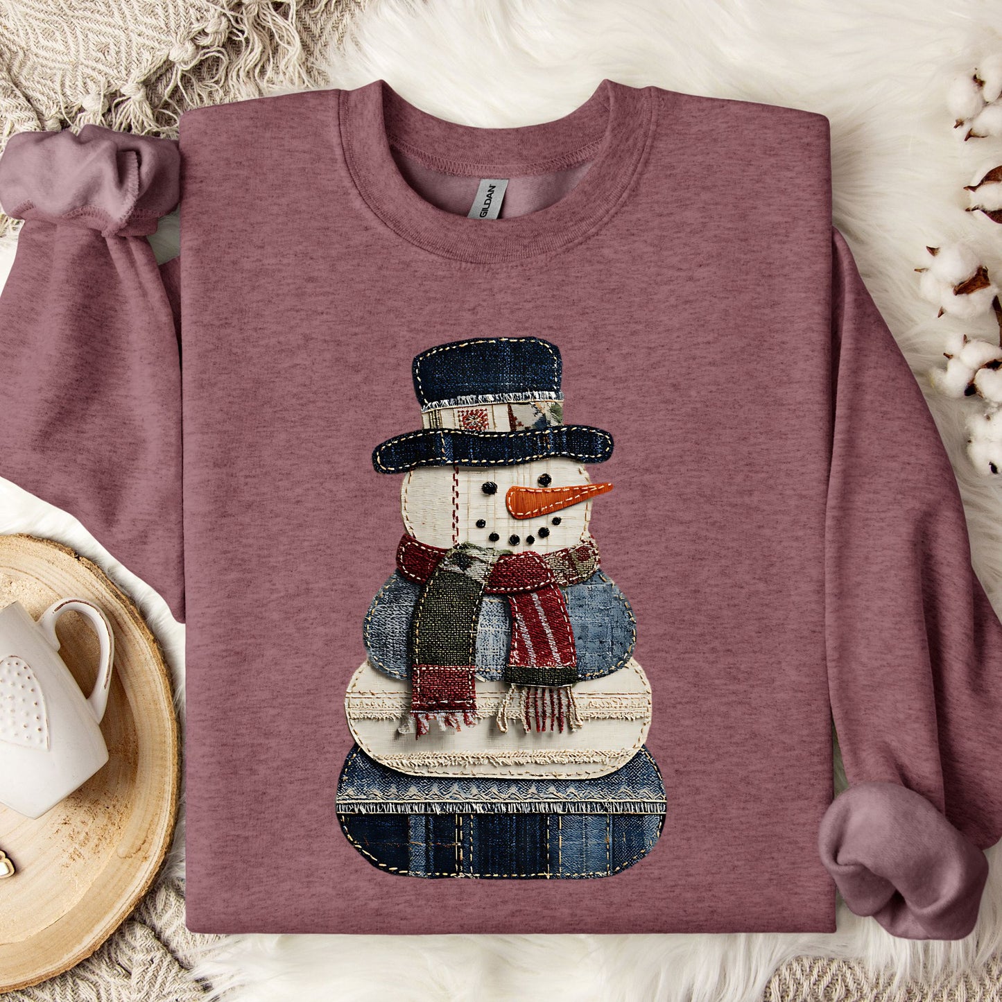 Heather Sport Dark Maroon Gildan sweatshirt with a faux patchwork denim snowman design.