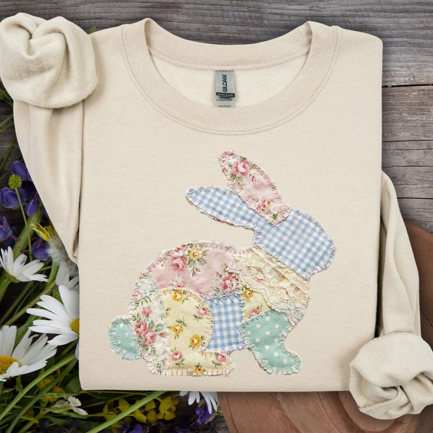 Sand crewneck sweatshirt with a patchwork floral and gingham bunny design.