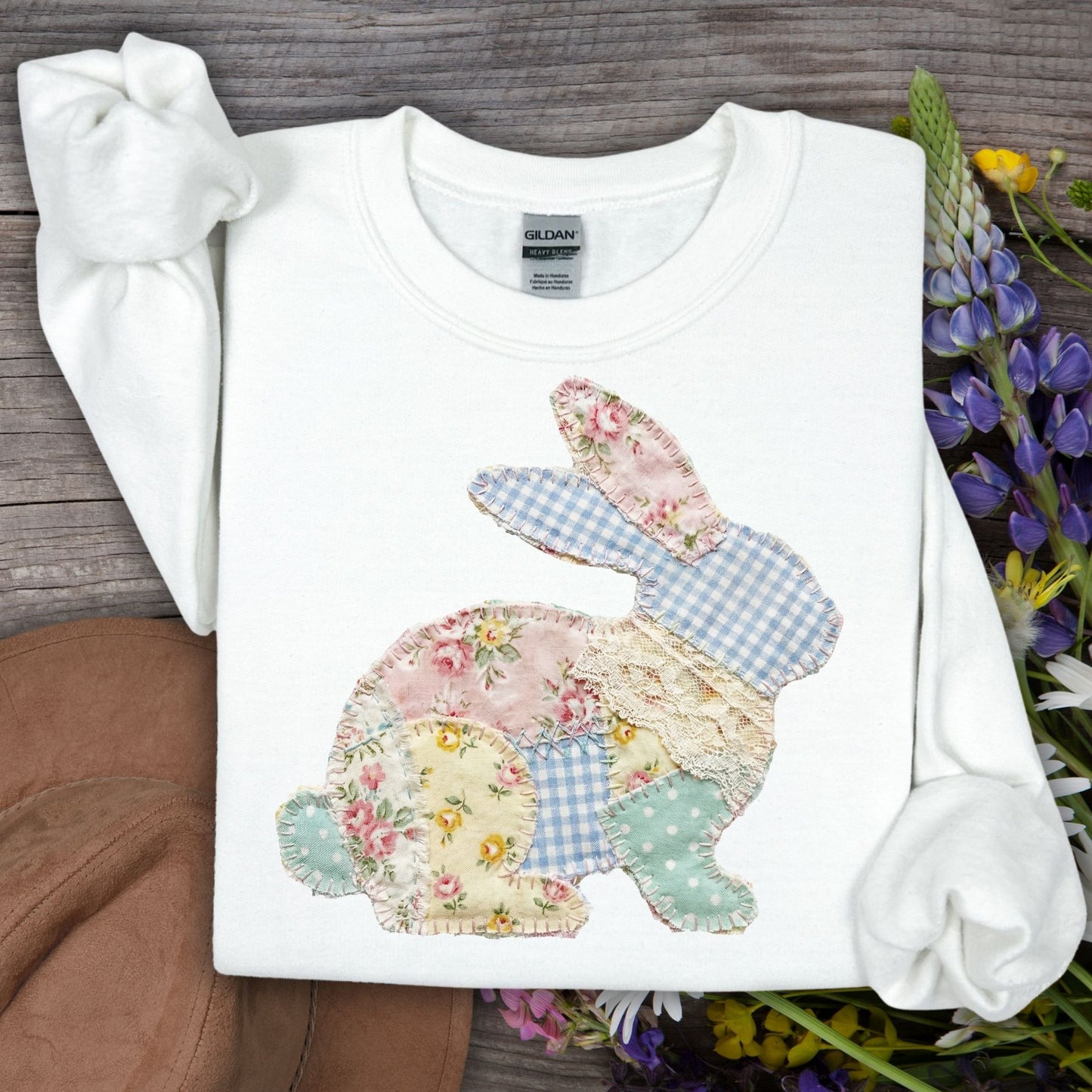 White Gildan sweatshirt with a patchwork floral and gingham bunny design.
