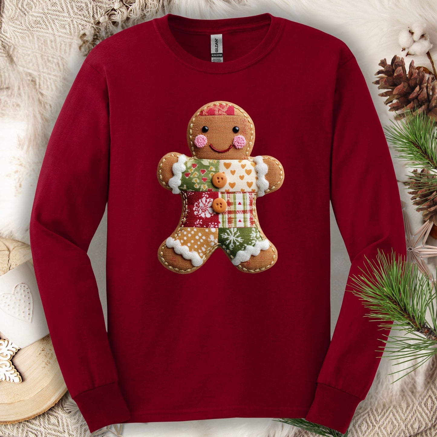 Cardinal Red Gildan long sleeve tee with a faux patchwork gingerbread man design.