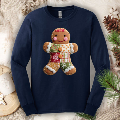 Navy long sleeve tee with a faux patchwork gingerbread man design, vintage textures, and homespun feel.