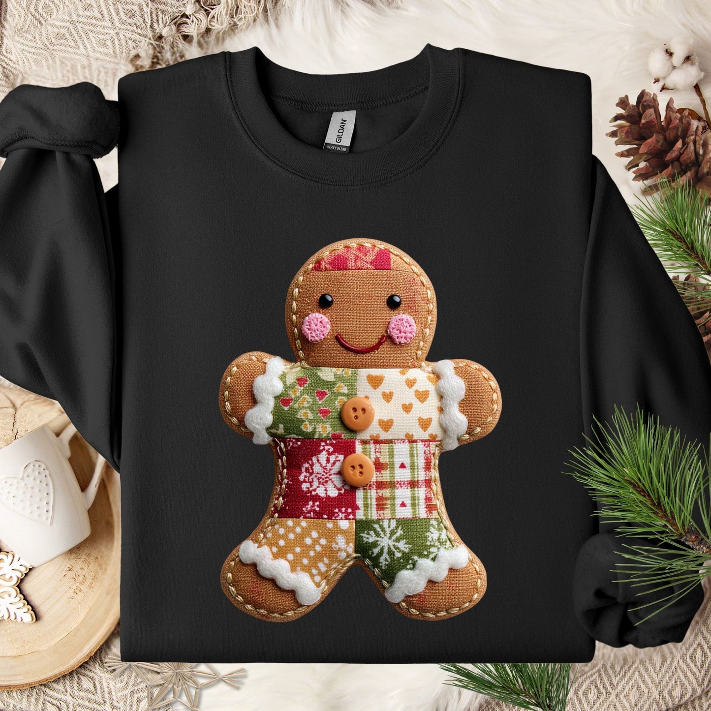 Black Gildan fleece sweatshirt with a vintage-style faux patchwork gingerbread man graphic.