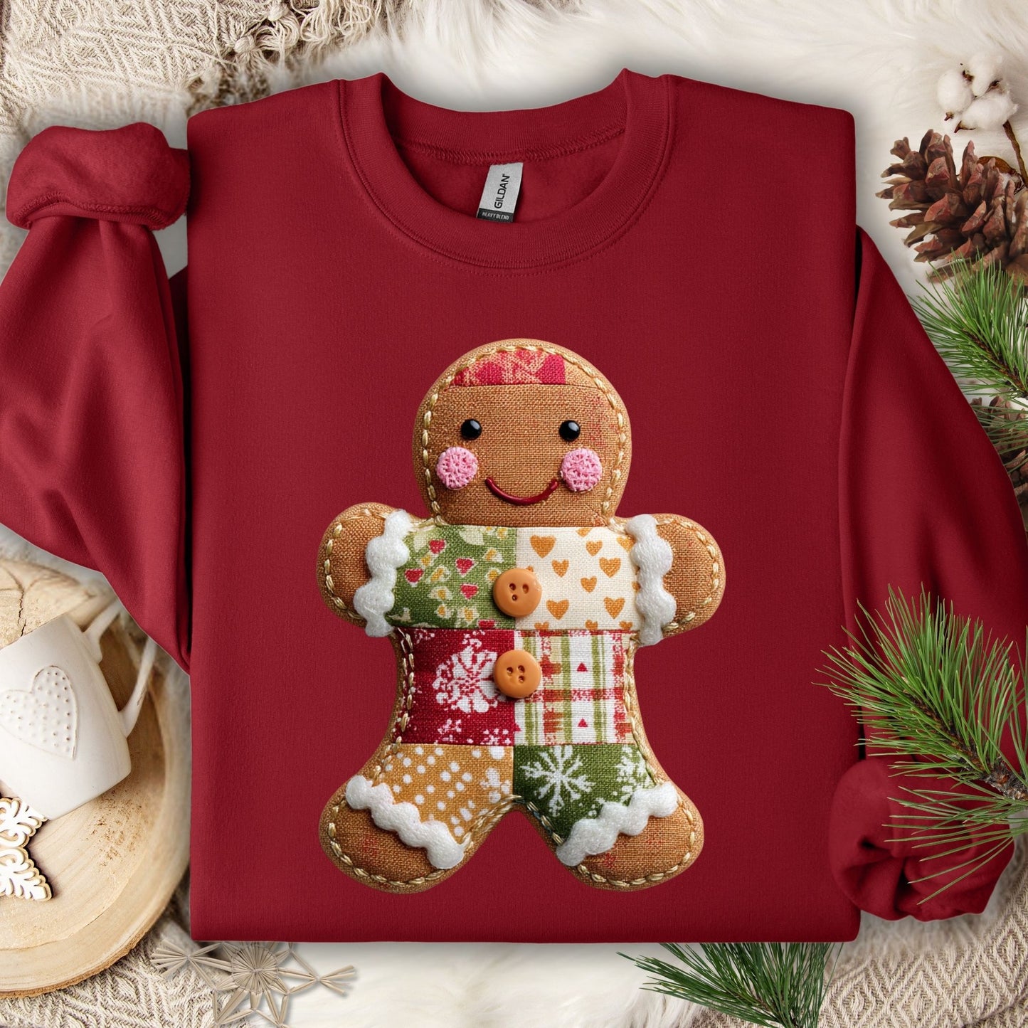 Cardinal Red Gildan sweatshirt with a vintage-style faux patchwork gingerbread man graphic.
