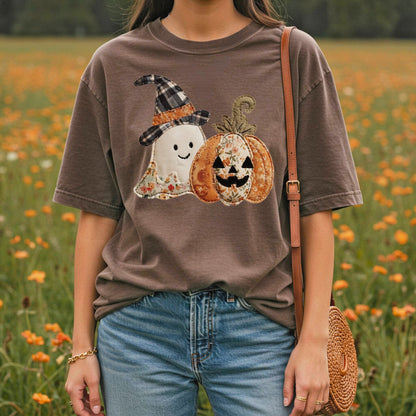 Brown Comfort Colors t-shirt with a faux patchwork ghost and jack o'lantern design.