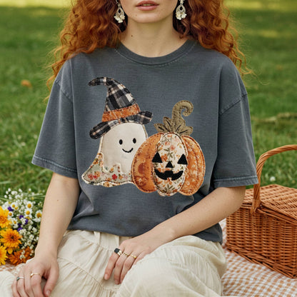 Charcoal Comfort Colors t-shirt with a faux patchwork ghost and jack o'lantern design.
