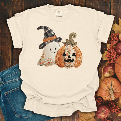Ivory Comfort Colors t-shirt with a faux patchwork ghost in a witch hat and a jack-o'-lantern.