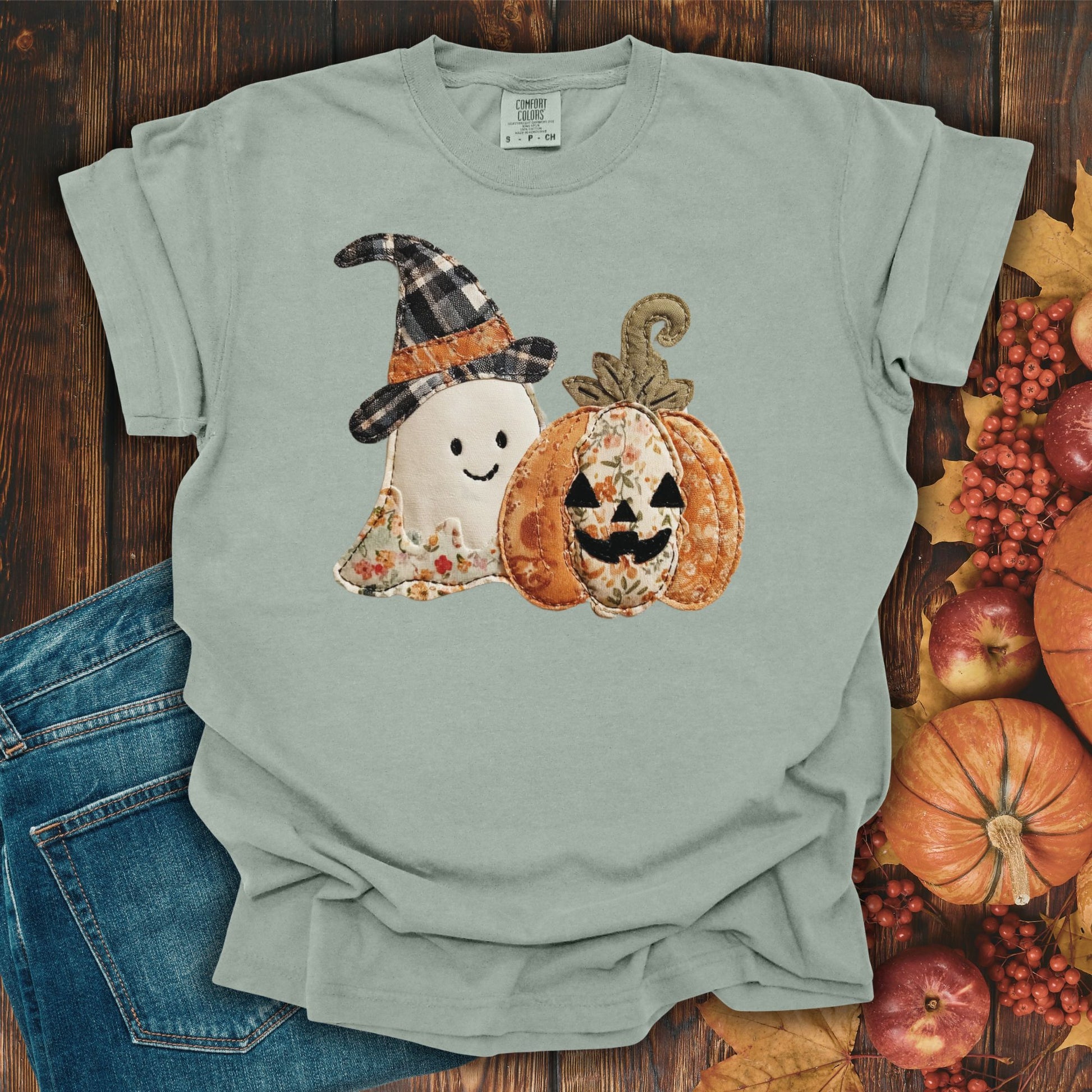 Bay Comfort Colors tee with a faux patchwork ghost in a plaid witch hat and a floral jack-o'-lantern.