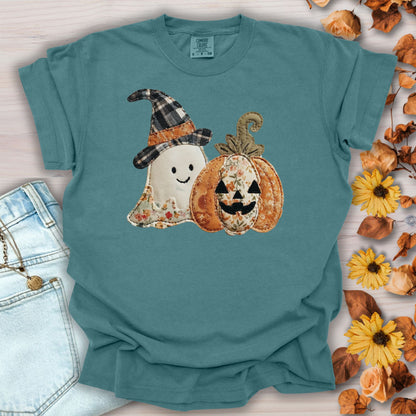 Blue Spruce Comfort Colors t-shirt with a faux patchwork ghost in a plaid witch hat and a floral jack o'lantern.