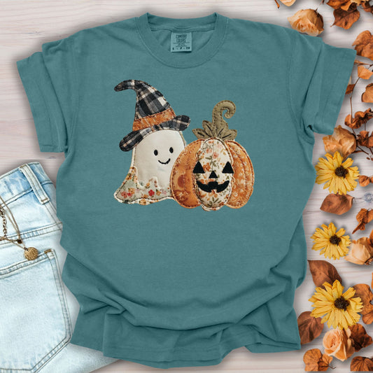 Blue Spruce Comfort Colors t-shirt with a faux patchwork ghost in a plaid witch hat and a floral jack o'lantern.