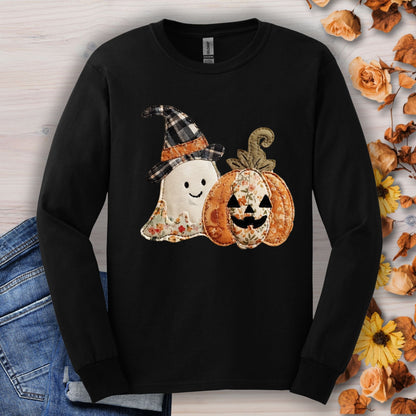 Black long sleeve tee with a faux patchwork ghost in a plaid witch hat and floral pumpkin.