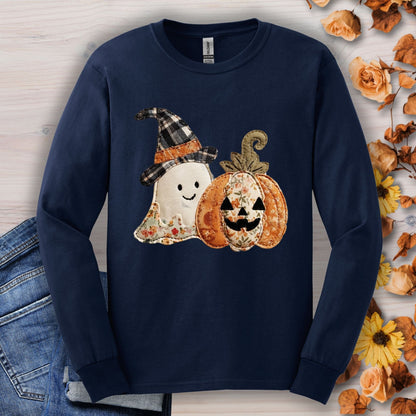 Navy long sleeve tee with faux patchwork ghost in witch hat and floral pumpkin design.