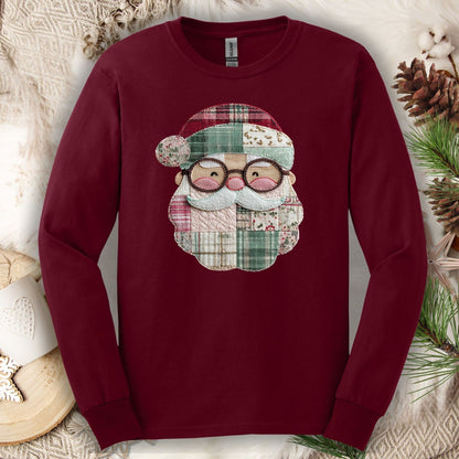 Maroon long sleeve tee with a printed patchwork Santa face in red, cream, and green.