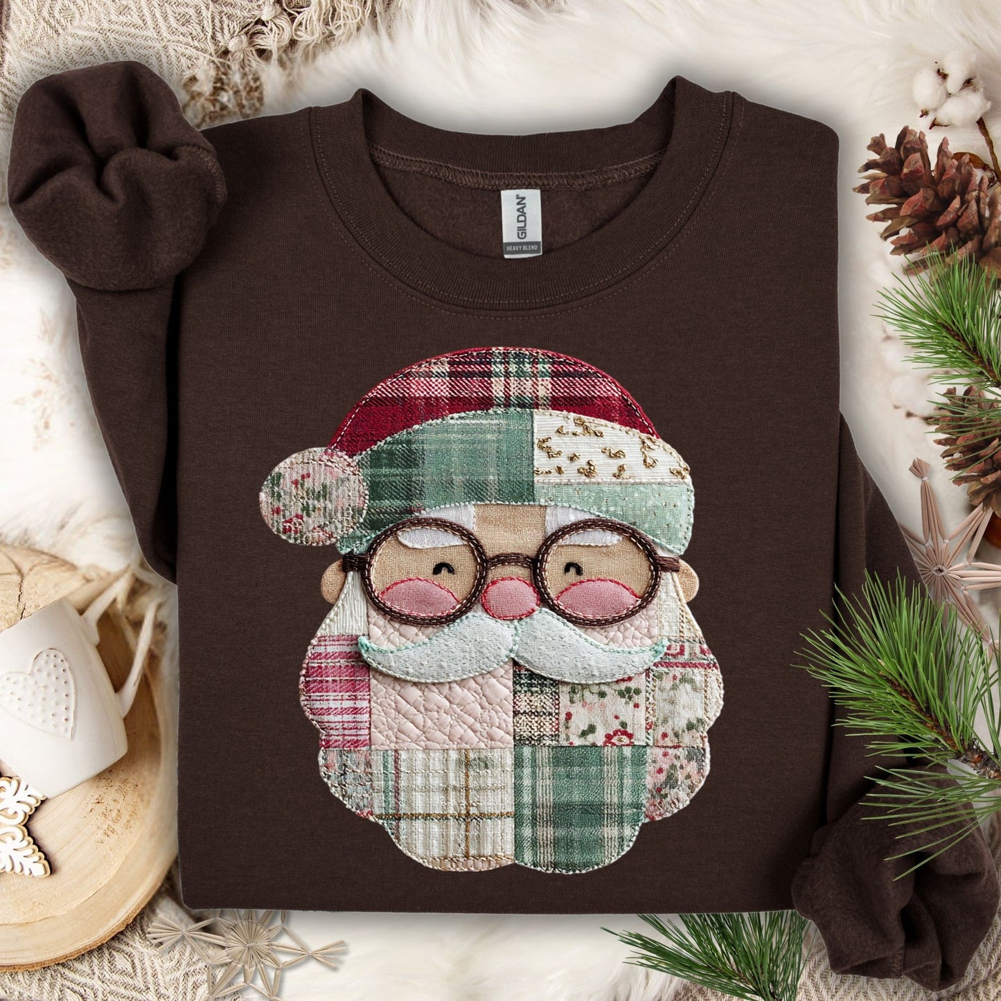 Dark Chocolate Gildan sweatshirt with a printed patchwork Santa face, featuring soft Christmas tones and cottagecore details.
