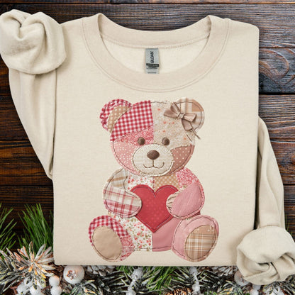 Sand S sweatshirt with a vintage patchwork teddy bear holding a red heart.