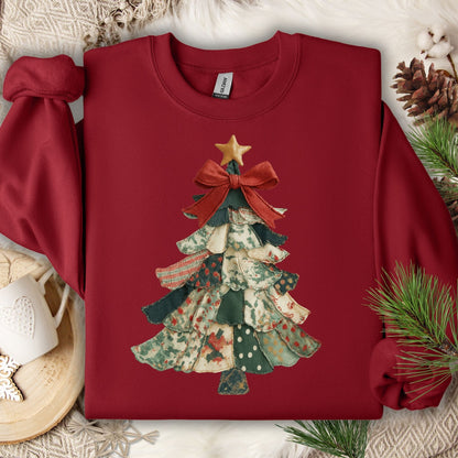 Cardinal Red sweatshirt with a vintage-inspired patchwork Christmas tree design and plush fleece interior.