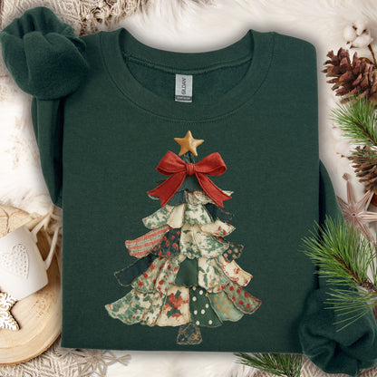 Forest Green S sweatshirt with a vintage-inspired patchwork Christmas tree design, red bow, and gold star.