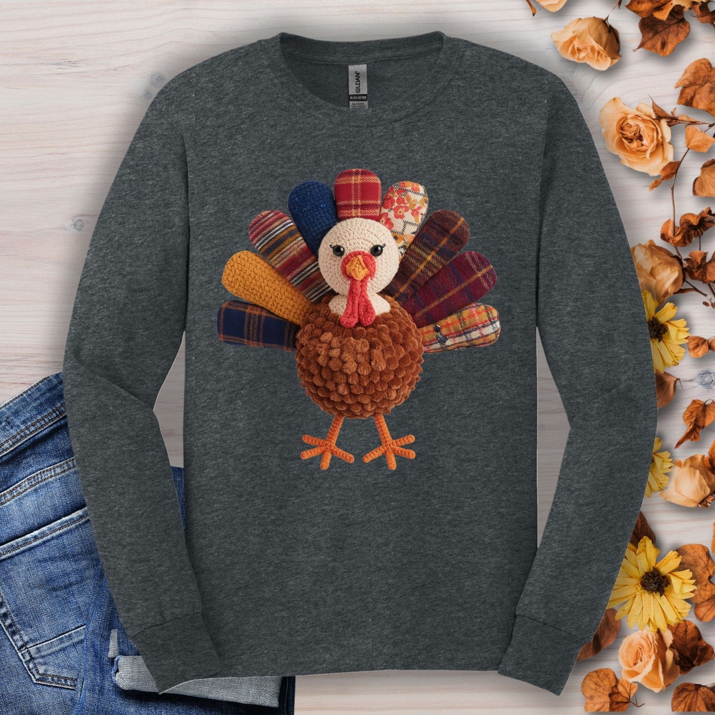 Dark Heather long sleeve tee with a faux patchwork and hook yarn turkey design.