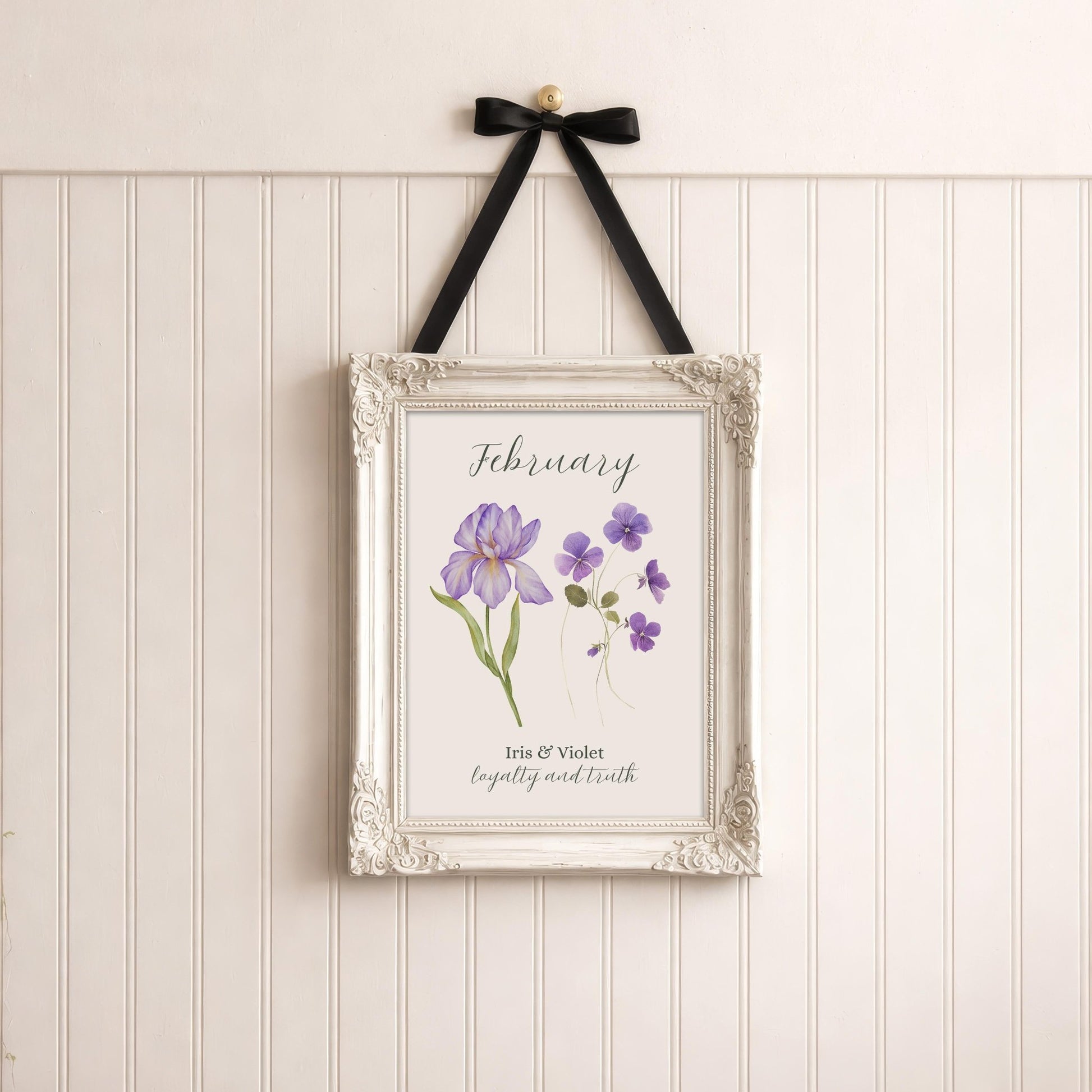 February birth flower art print in an ornate white frame with purple iris and violet flowers.