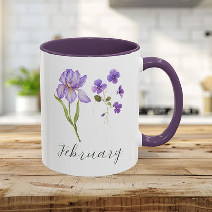 White ceramic mug with purple interior and handle, featuring February birth flowers violet and iris.