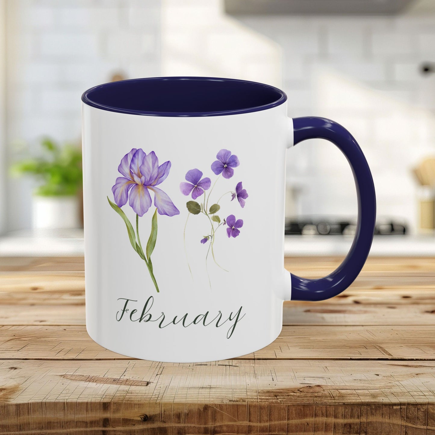 11oz white ceramic mug with navy interior/handle, featuring watercolor purple iris and violet blooms, and "February" text.