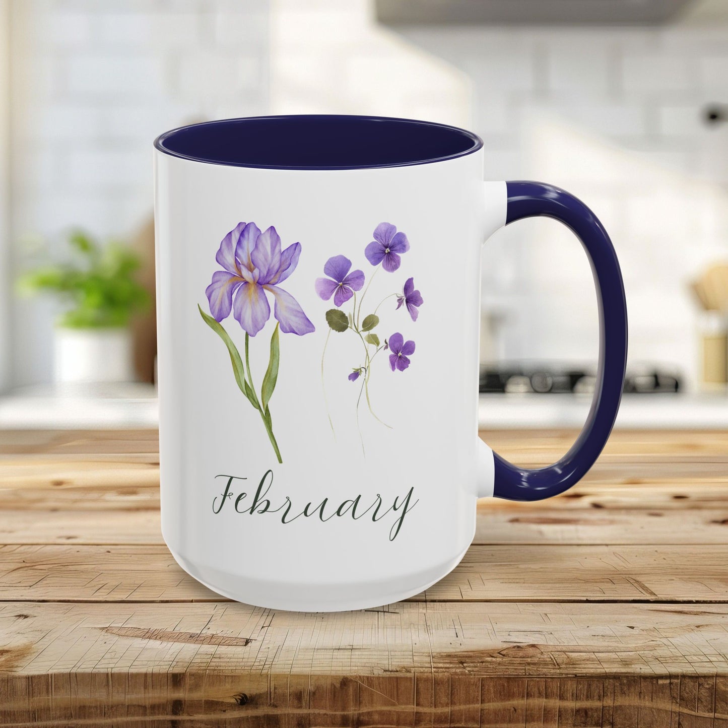 White ceramic 15oz mug with navy interior and handle, featuring watercolor purple iris and violet blooms and "February".